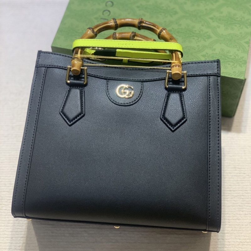 G*u*i top handle bags